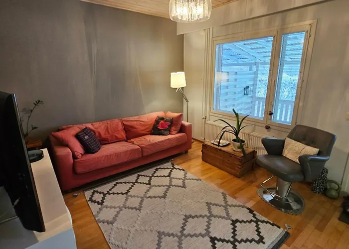 Photo de Kotoisa Rivitalokaksio Lammilla & Easy Check In